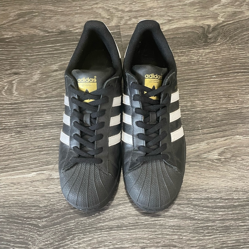 Black and white size 10 Adidas!